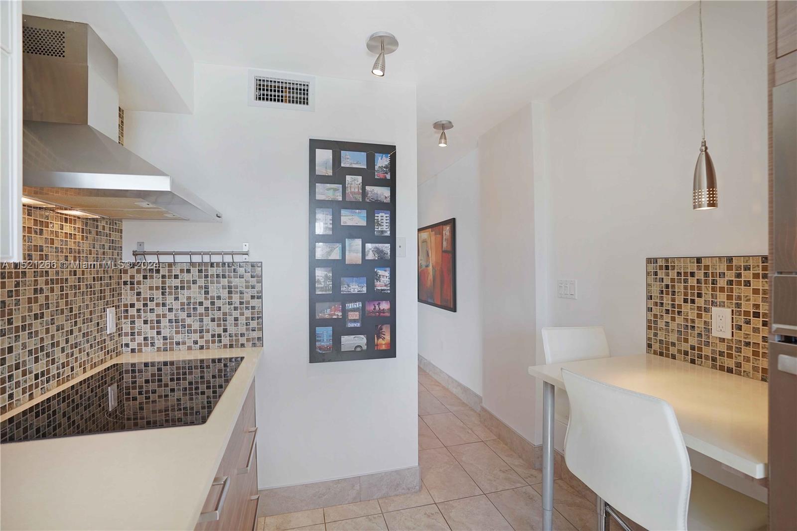 245 18th Street, Unit 902 Miami Beach, FL 33139 - Photo 33 of 54 a bathroom with a bathtub and shower