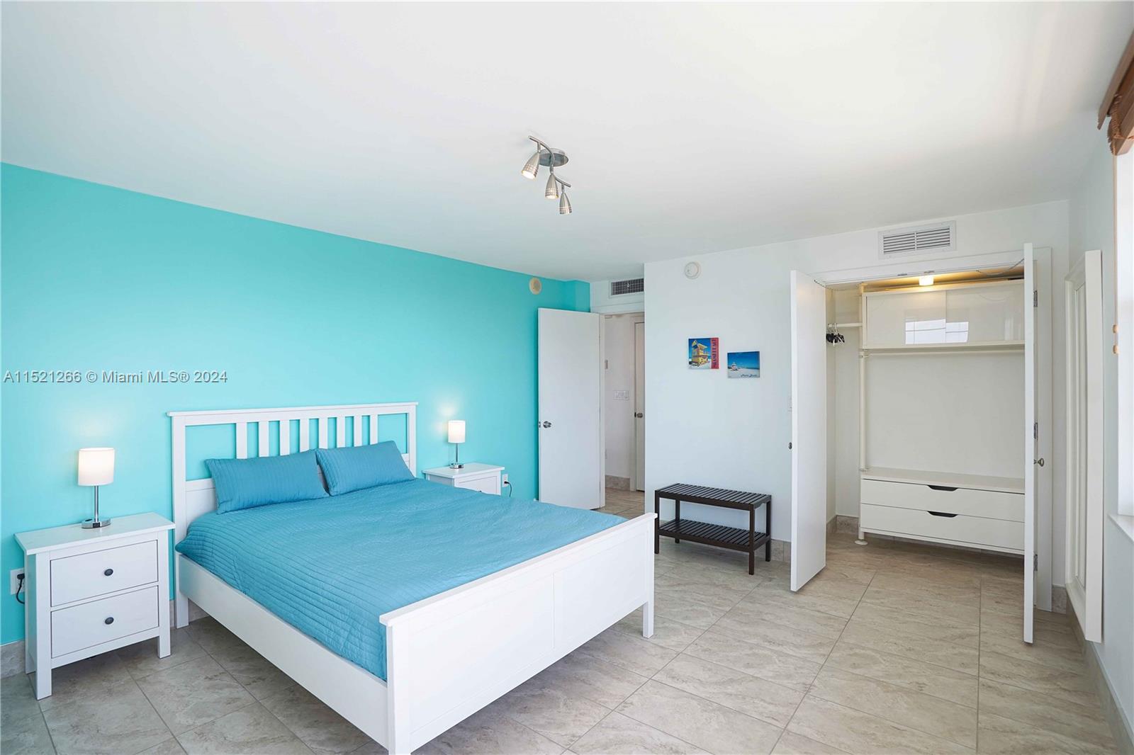 245 18th Street, Unit 902 Miami Beach, FL 33139 - Photo 39 of 54 a spacious bedroom with a bed and a view of bedroom