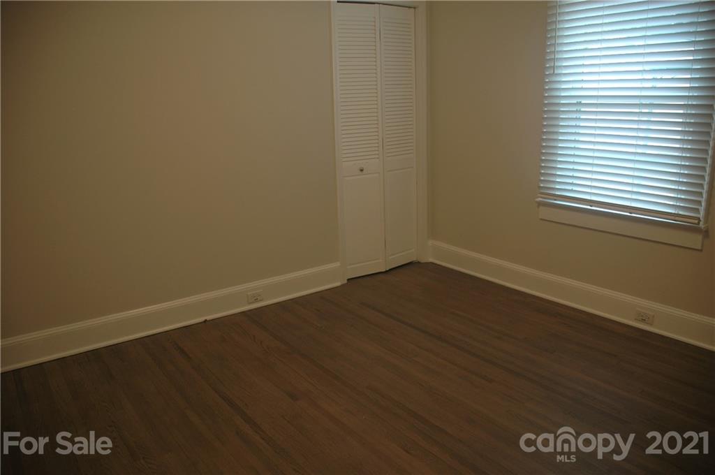 521 Gray Drive Charlotte, NC 28213 - Photo 17 of 34 an empty room with a window