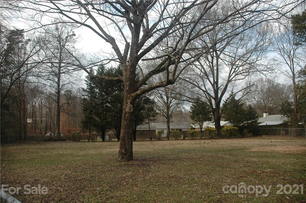 521 Gray Drive Charlotte, NC 28213 - Photo 26 of 34 a view of road with trees
