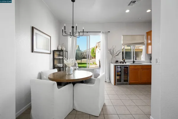a kitchen with stainless steel appliances a sink and a refrigerator