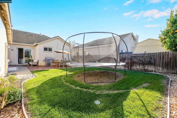 a view of a yard with an trees