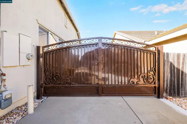 a view of outdoor space with wooden fence