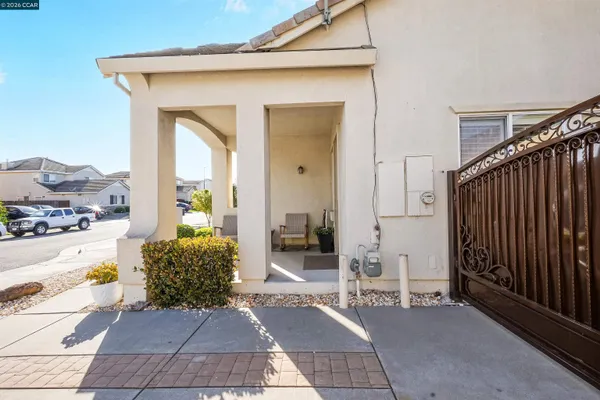 a view of a entryway door front of a house