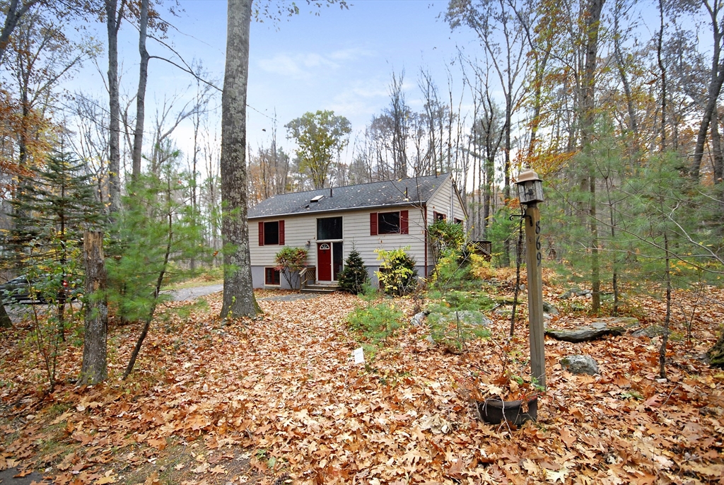 869 Burroughs Road Boxborough, MA 01719 - Photo 18 of 19 a view of a house with backyard