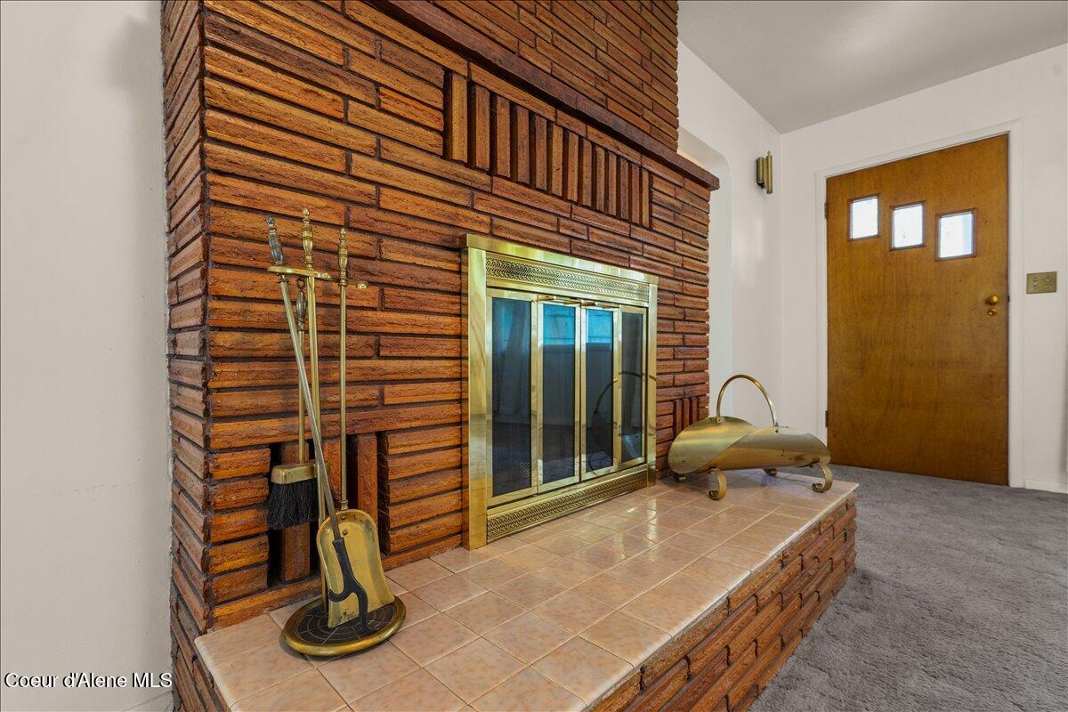 2122 Nine Mile Road, Unit B Wallace, ID 83873 - Photo 12 of 41 11-Family Room fireplace