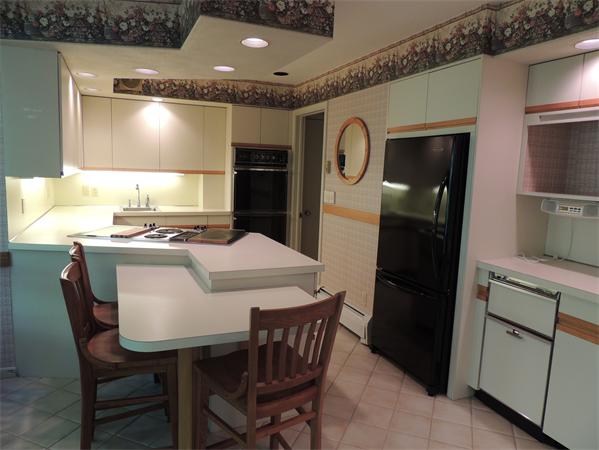 12 Alden Thrasher Road Monson, MA 01057 - Photo 11 of 26 a kitchen with a table and chairs