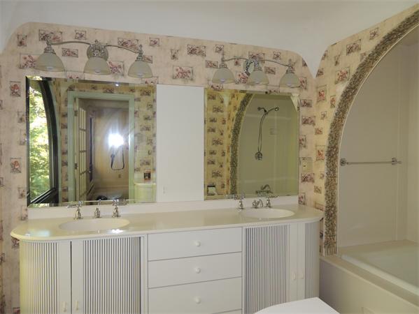 12 Alden Thrasher Road Monson, MA 01057 - Photo 20 of 26 a bathroom with a double vanity sink mirror and a bathtub