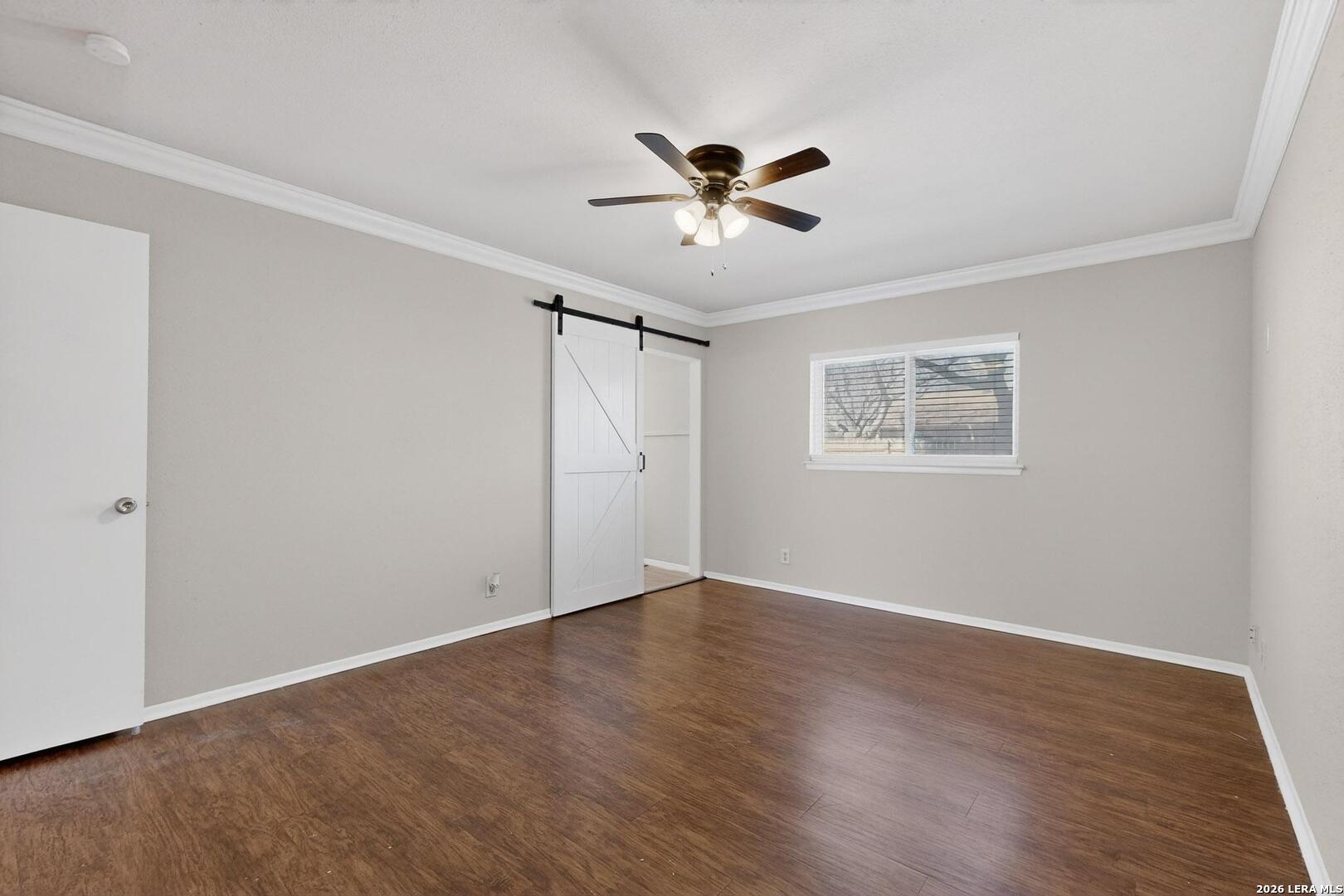 7219 Spring Drops Street San Antonio, TX 78249 - Photo 19 of 37 a view of an empty room with wooden floor