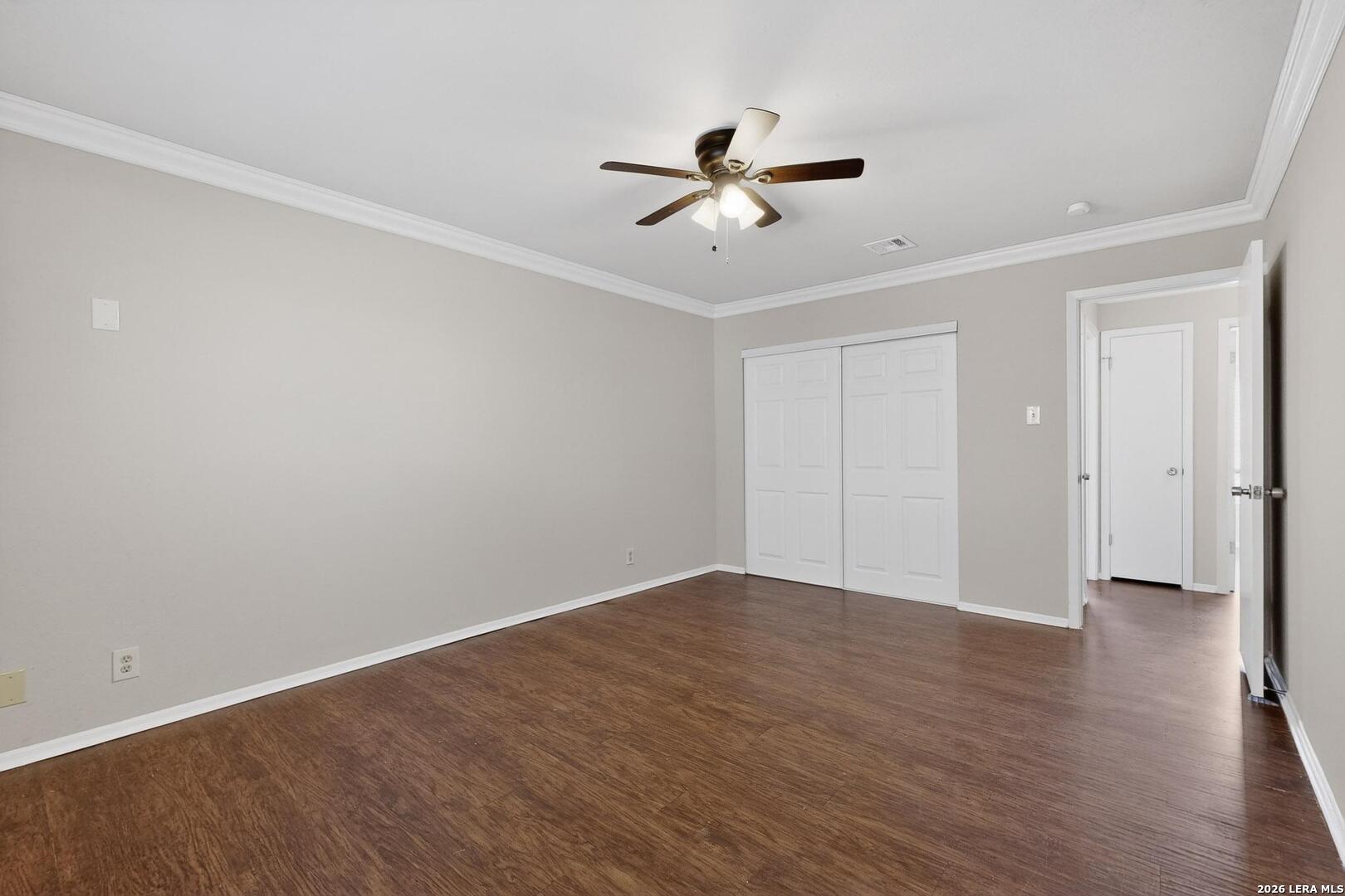 7219 Spring Drops Street San Antonio, TX 78249 - Photo 20 of 37 a view of an empty room with wooden floor