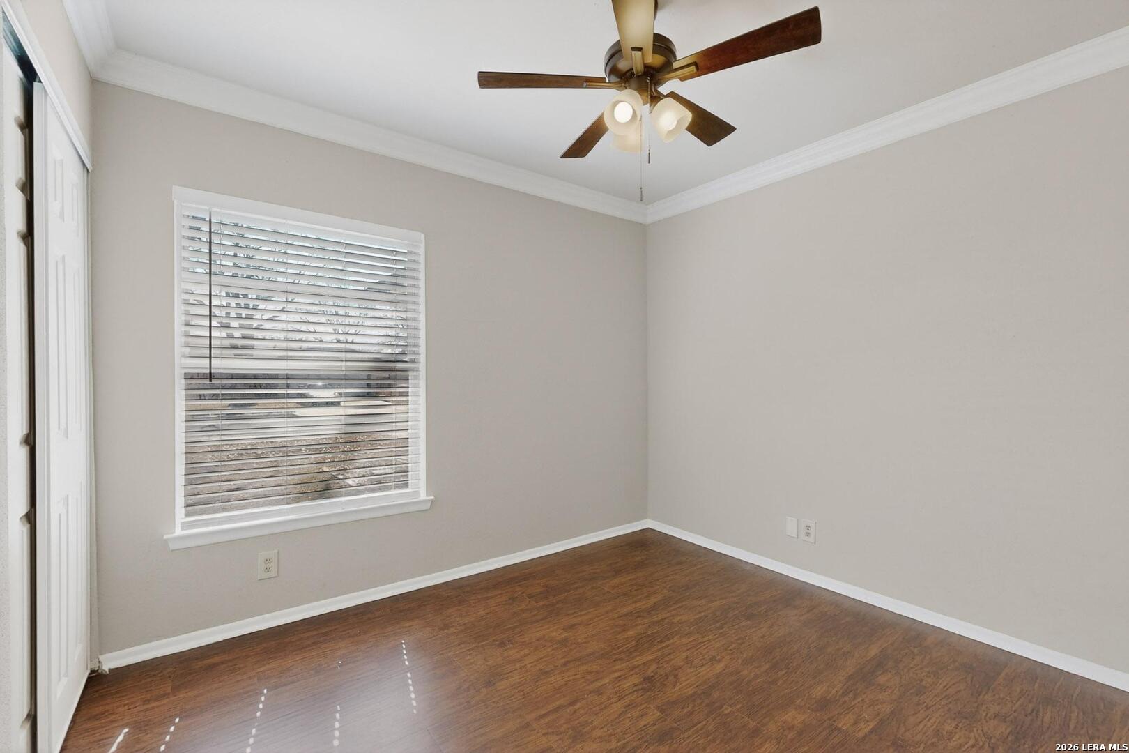 7219 Spring Drops Street San Antonio, TX 78249 - Photo 28 of 37 an empty room with a window and a fan