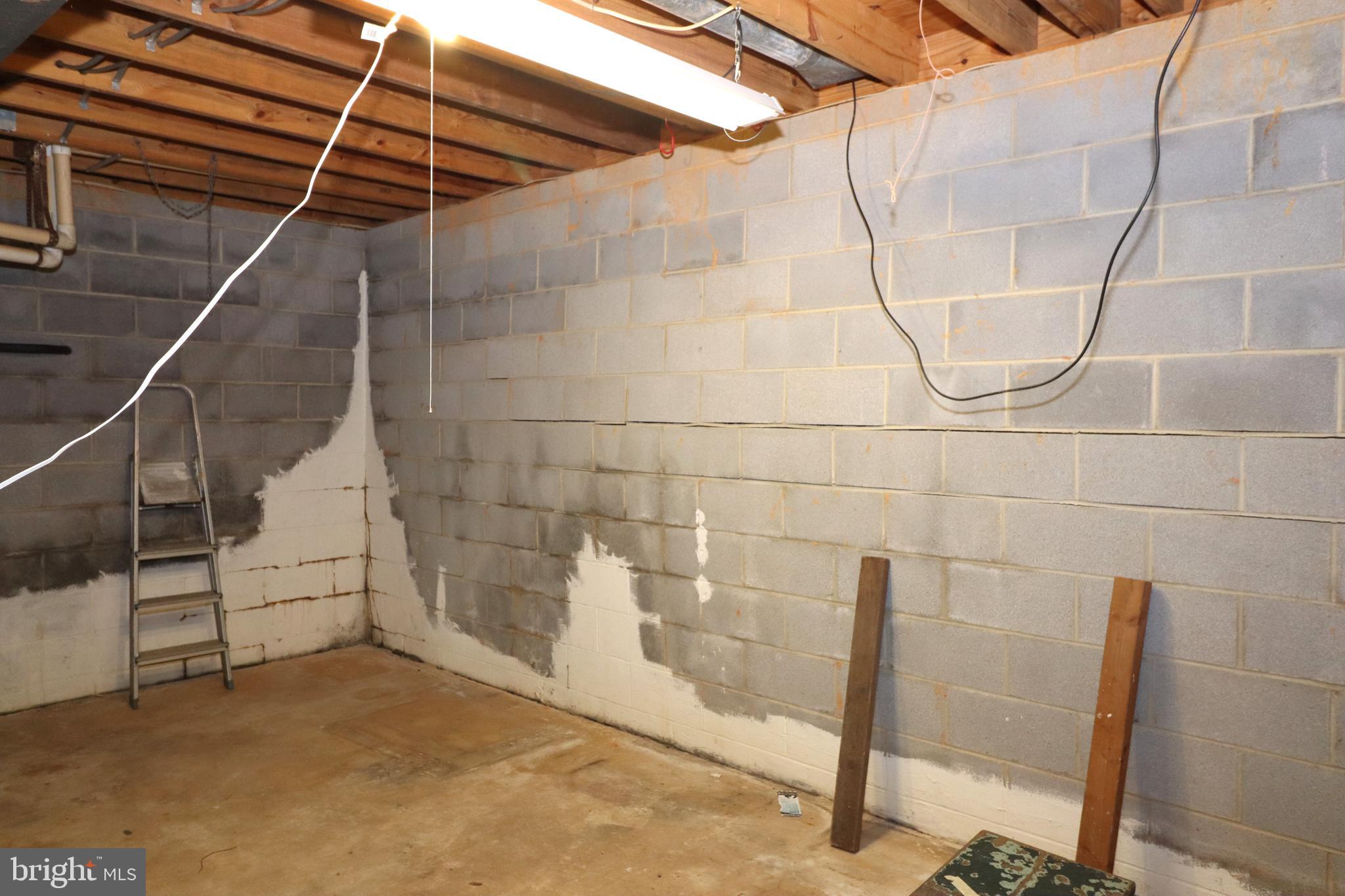 9305 Lees Ridge Road Warrenton, VA 20186 - Photo 25 of 40 Lower level unfinished area storage or finish