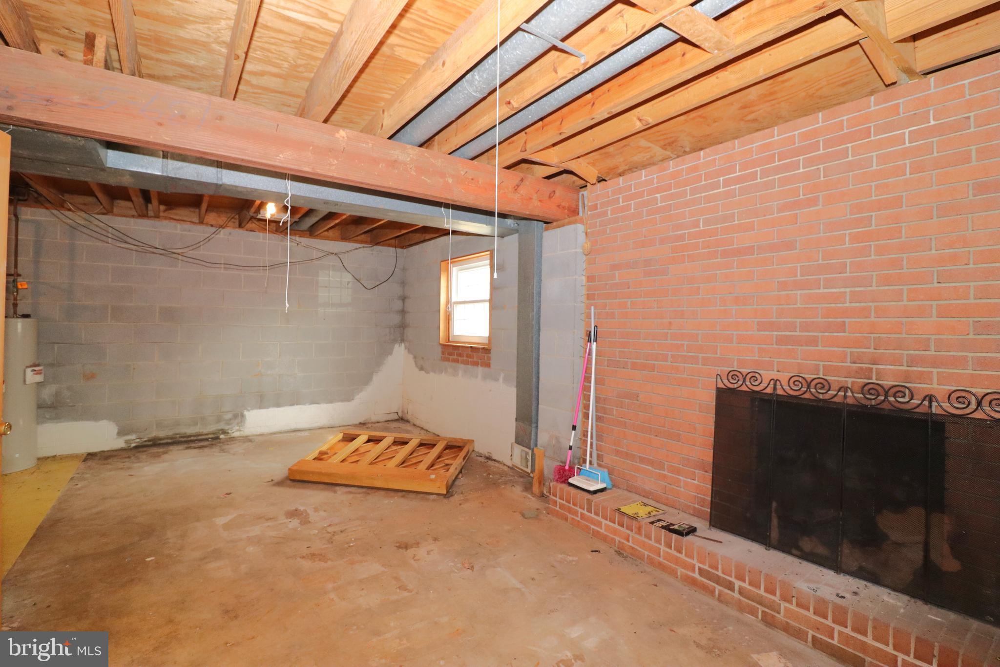 9305 Lees Ridge Road Warrenton, VA 20186 - Photo 26 of 40 Unfinished Rec or Family room with fireplace