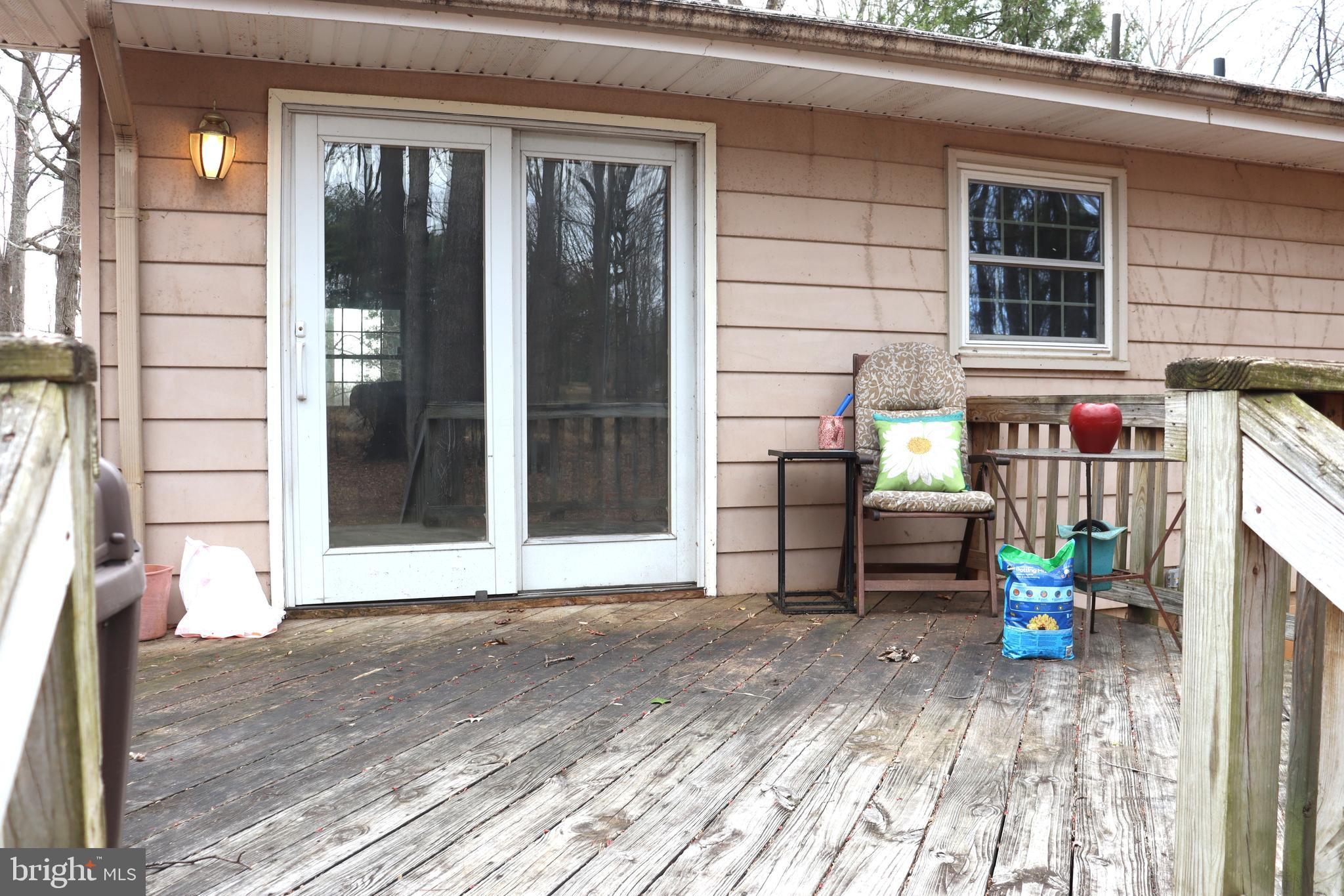 9305 Lees Ridge Road Warrenton, VA 20186 - Photo 32 of 40 Rear deck opens to dining area for easy grilling