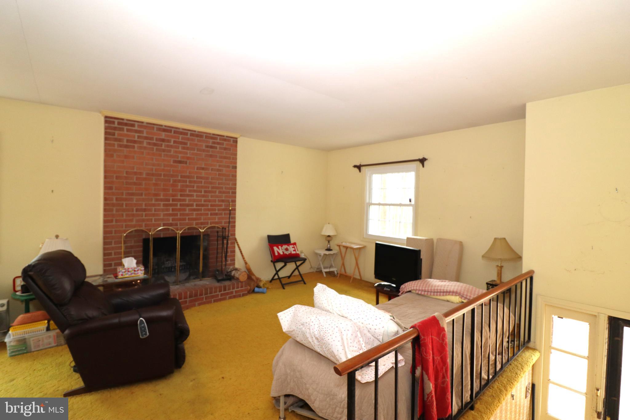 9305 Lees Ridge Road Warrenton, VA 20186 - Photo 5 of 40 Living room with masonry fireplace