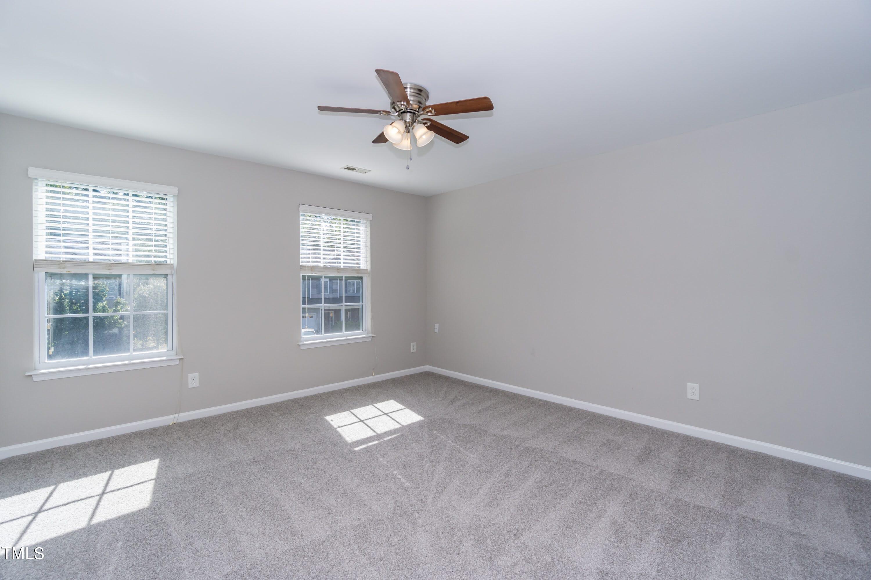 408 Cottesbrook Drive Wake Forest, NC 27587 - Photo 24 of 37 a view of an empty room with a window
