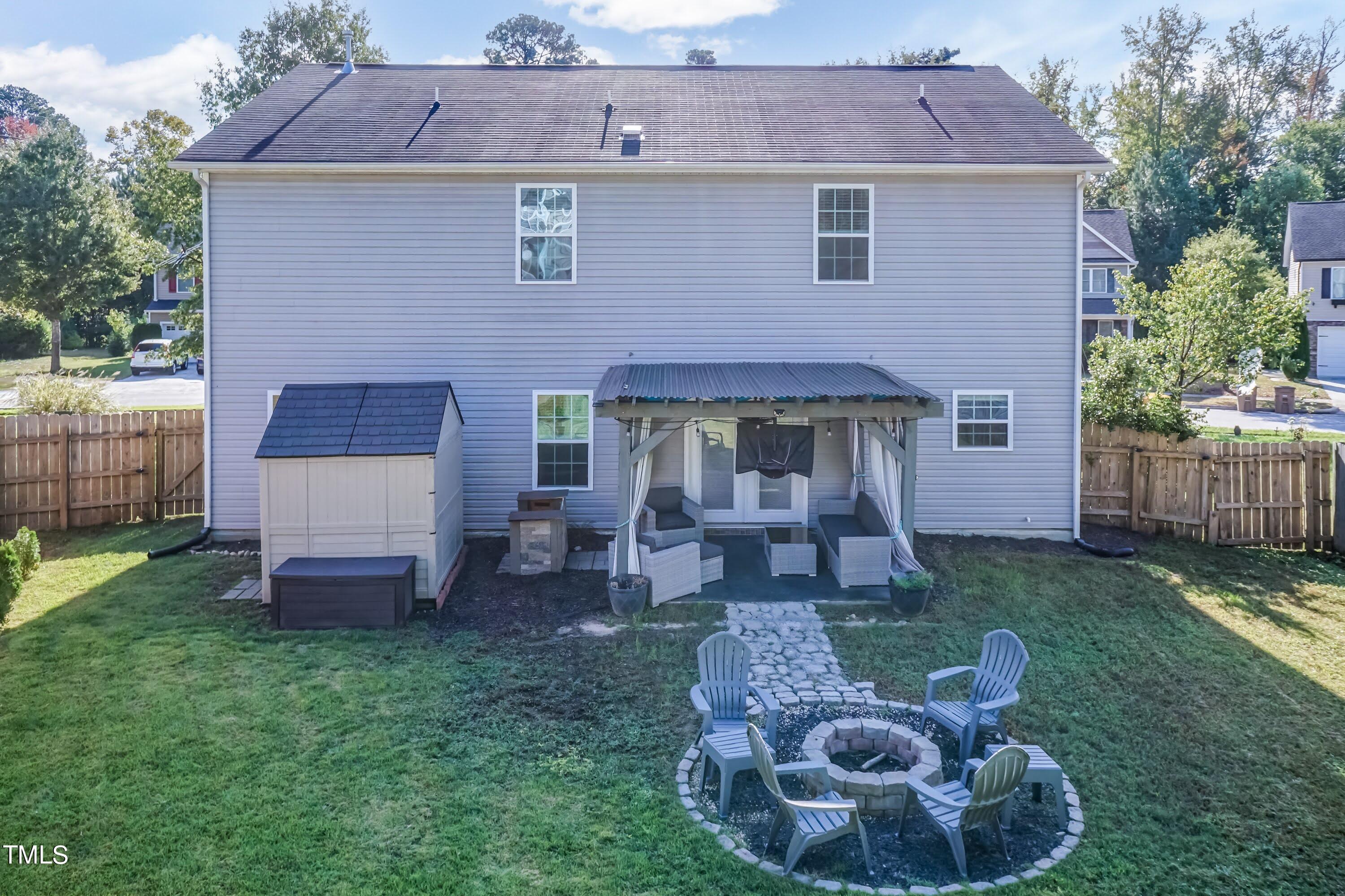 408 Cottesbrook Drive Wake Forest, NC 27587 - Photo 27 of 37 a front view of a house with a garden and plants