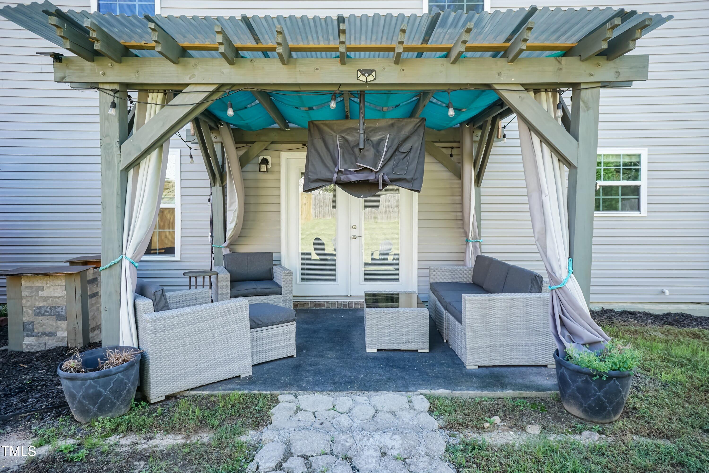 408 Cottesbrook Drive Wake Forest, NC 27587 - Photo 29 of 37 a view of a patio with couches and potted plants