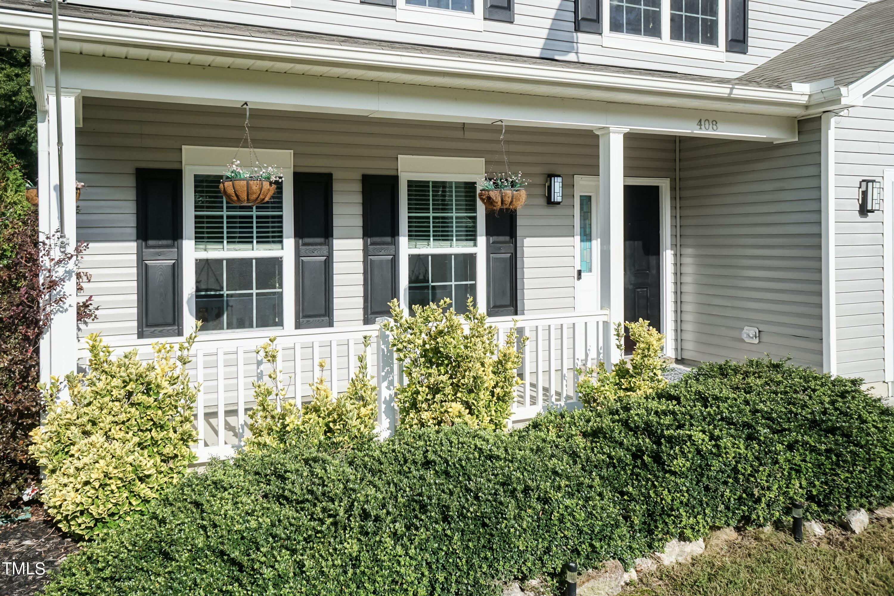 408 Cottesbrook Drive Wake Forest, NC 27587 - Photo 3 of 37 a view of a house with potted plants