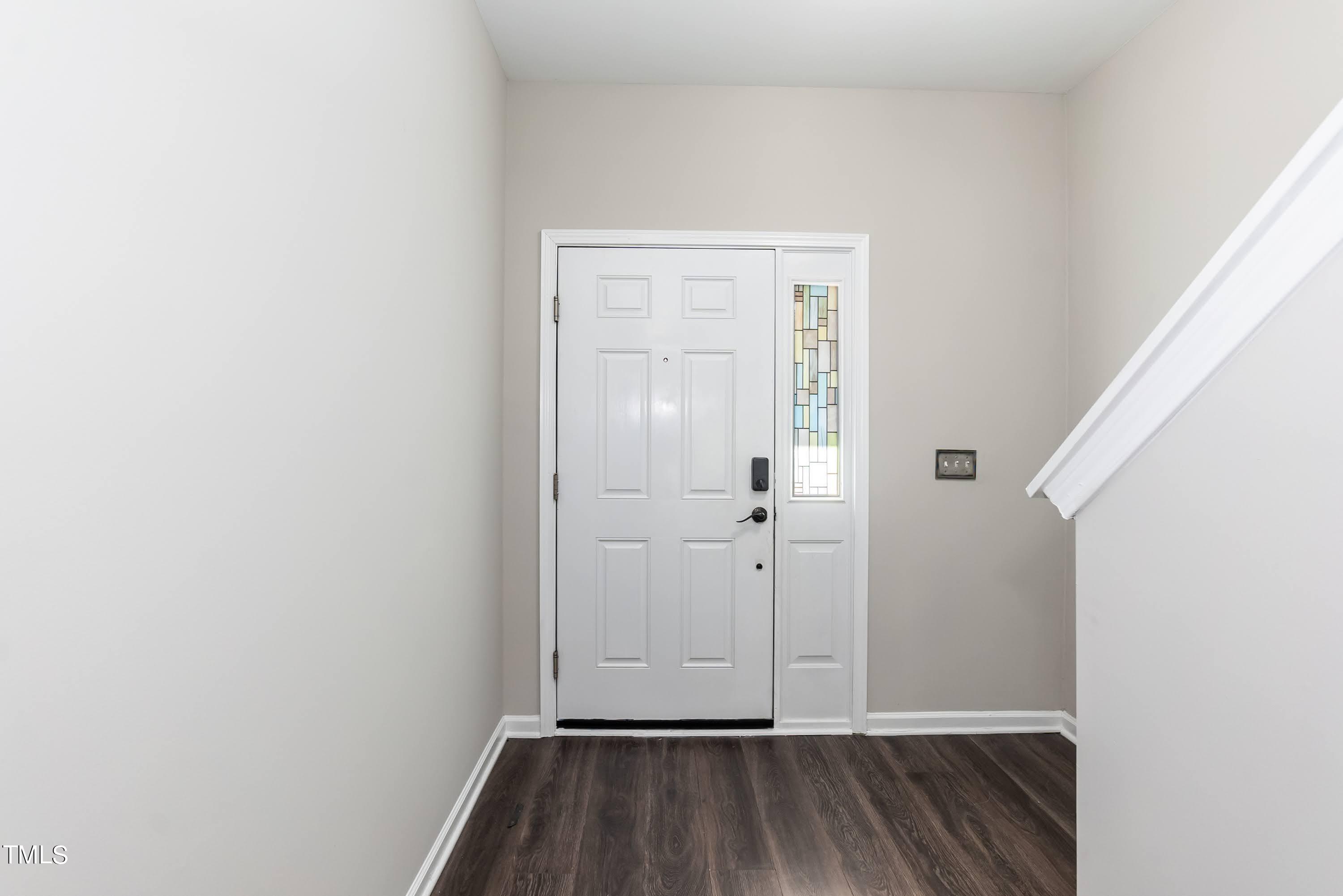 408 Cottesbrook Drive Wake Forest, NC 27587 - Photo 4 of 37 a view of front door with wooden floor
