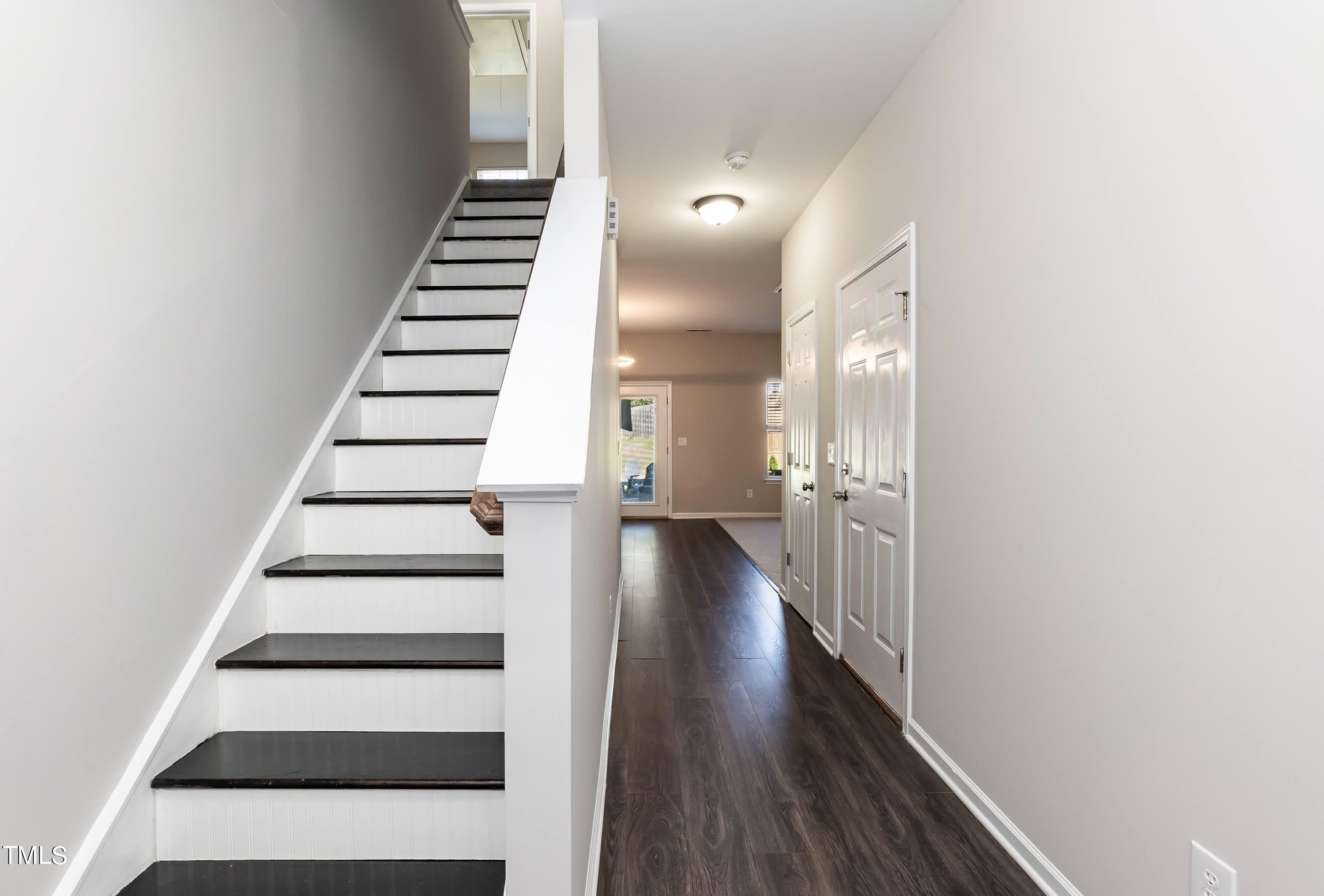 408 Cottesbrook Drive Wake Forest, NC 27587 - Photo 5 of 37 a view of entryway and hall with wooden floor
