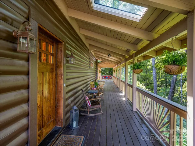 a view of a balcony with chairs