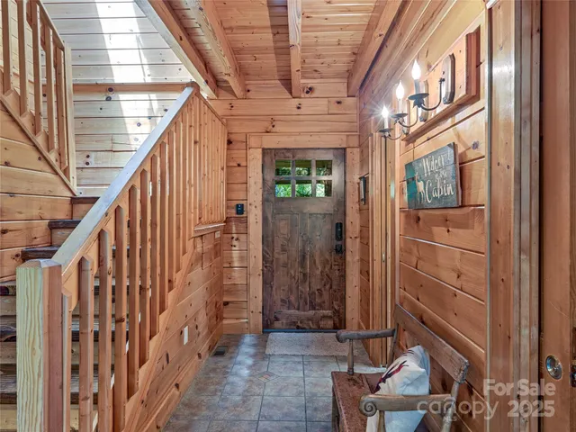 a view of entryway with a front door