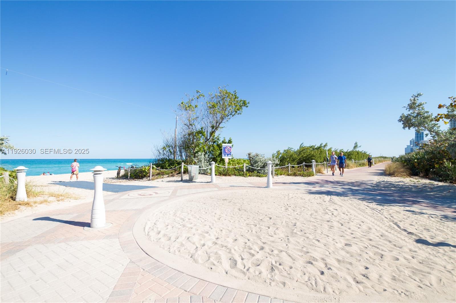 7915 Harding Avenue, Unit 1 Miami Beach, FL 33141 - Photo 23 of 25 a view of a swimming pool and an outdoor space