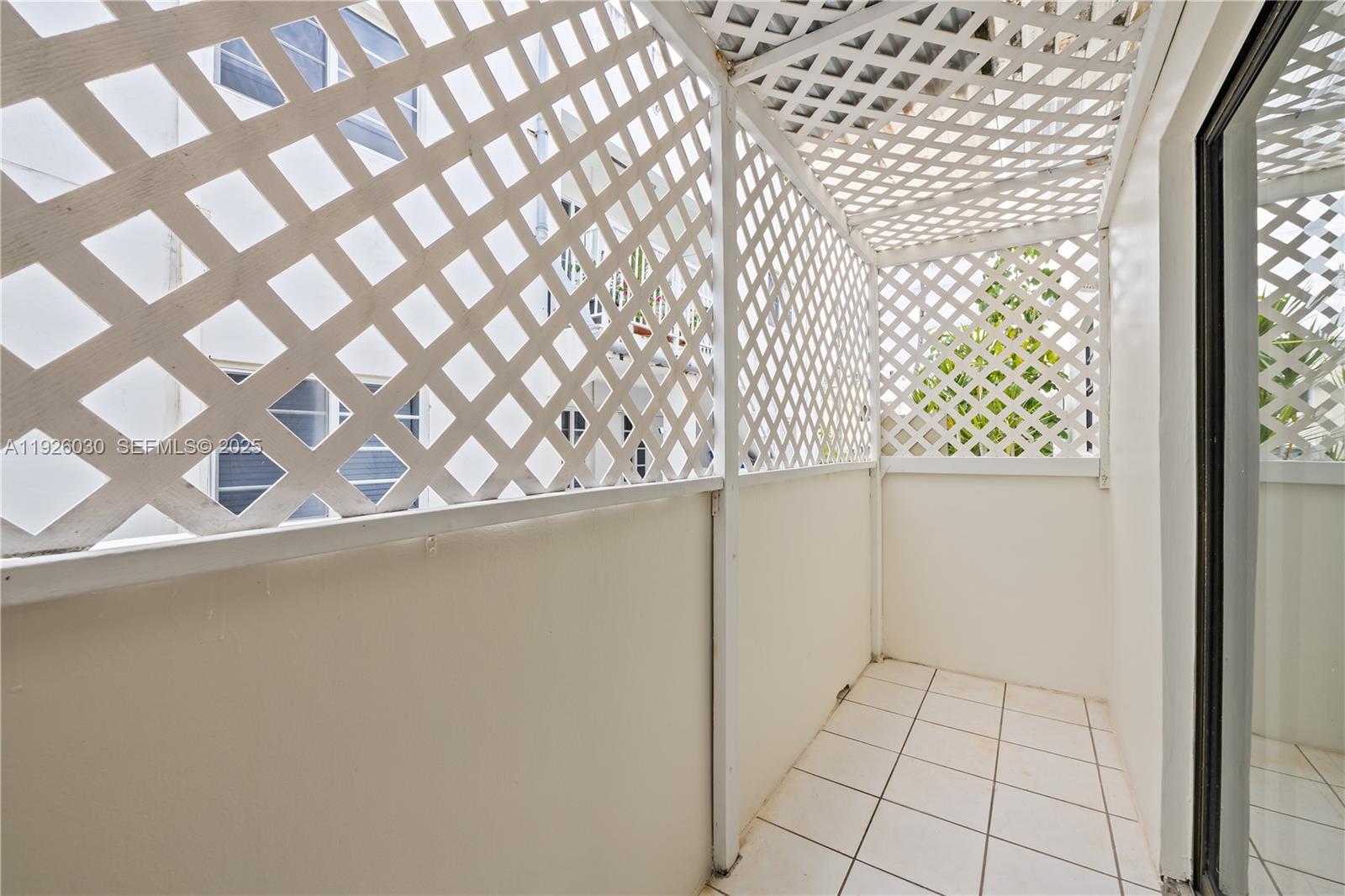 7915 Harding Avenue, Unit 1 Miami Beach, FL 33141 - Photo 6 of 25 a view of a closet from a window