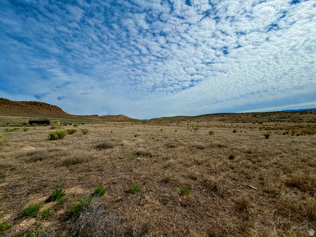600 East E Street Moroni, UT 84646 - Photo 34 of 38 Expansive undeveloped land featuring natural desert vegetation and distant hills