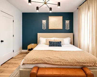 a bedroom with a bed and window