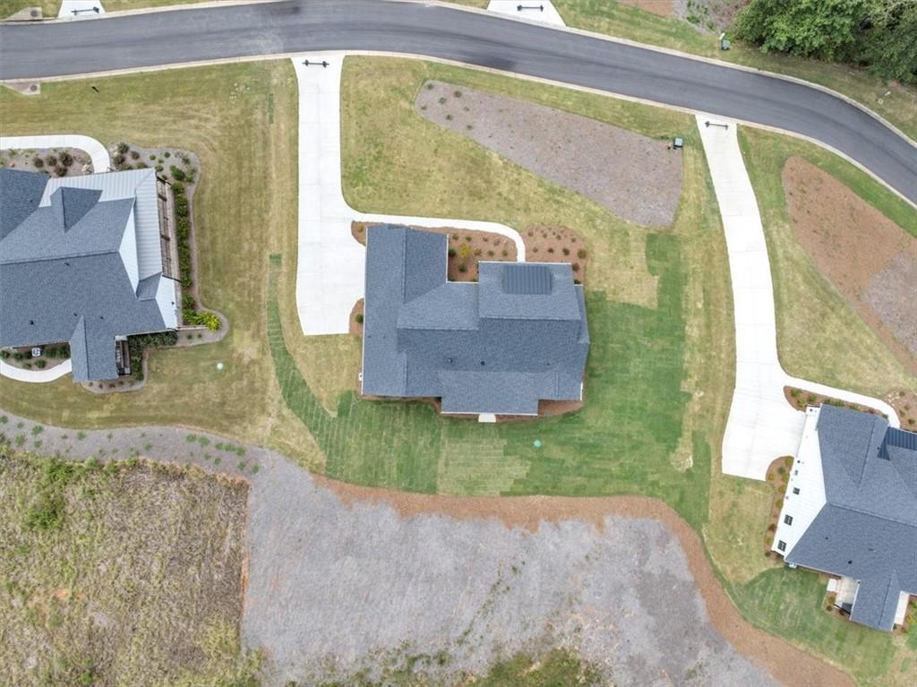 354 Oxford Road Ball Ground, GA 30107 - Photo 48 of 48 a aerial view of a house with a yard