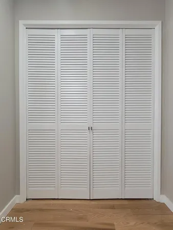 a view of a room that has a window in it