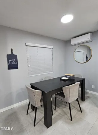 a view of a workspace with furniture