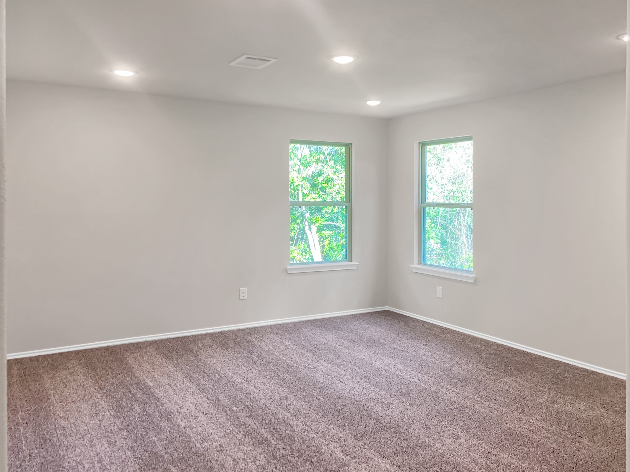 405 Mohawk Drive Conroe, TX 77316 - Photo 19 of 22 an empty room with windows