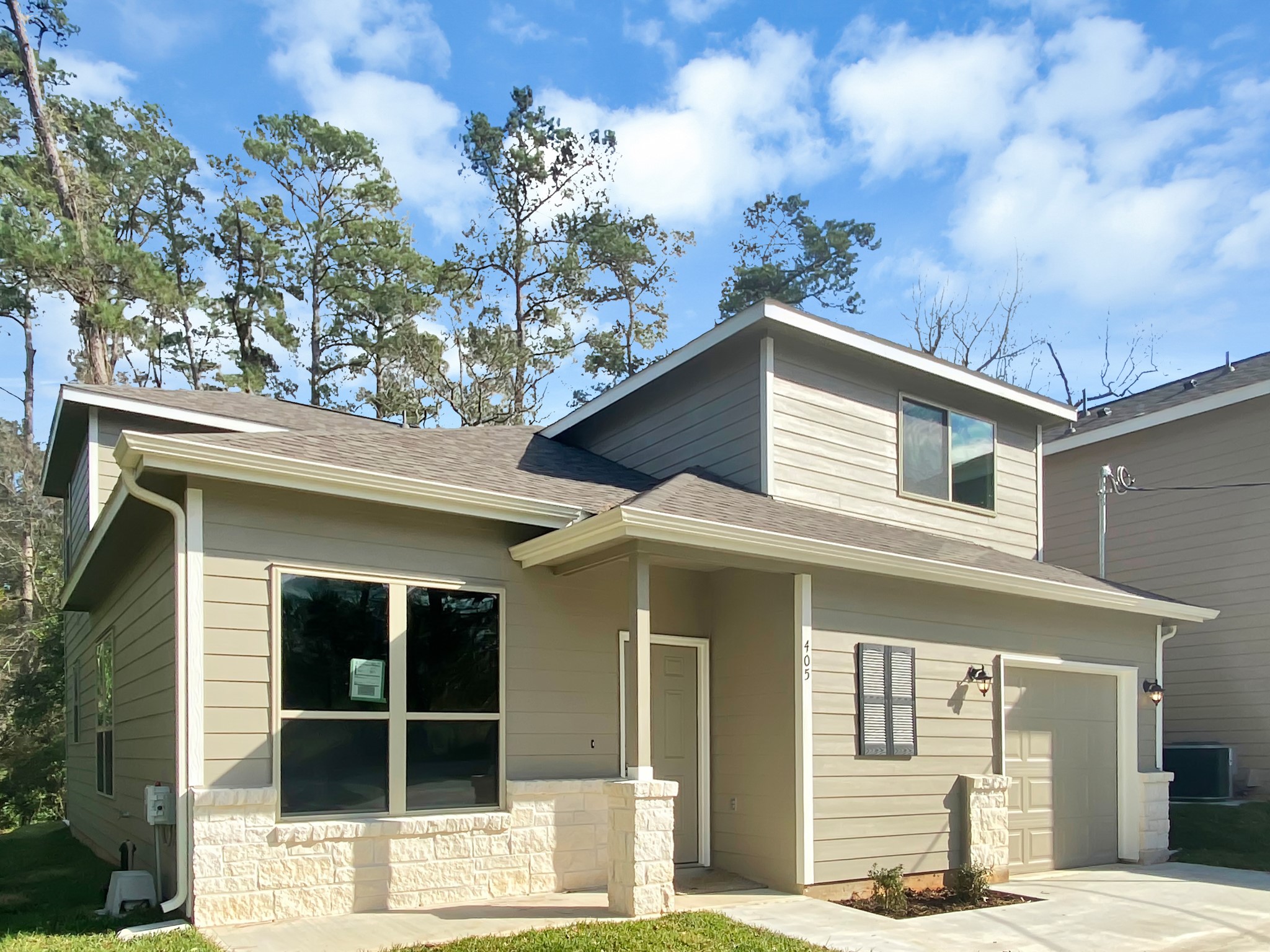405 Mohawk Drive Conroe, TX 77316 - Photo 3 of 22 a front view of a house