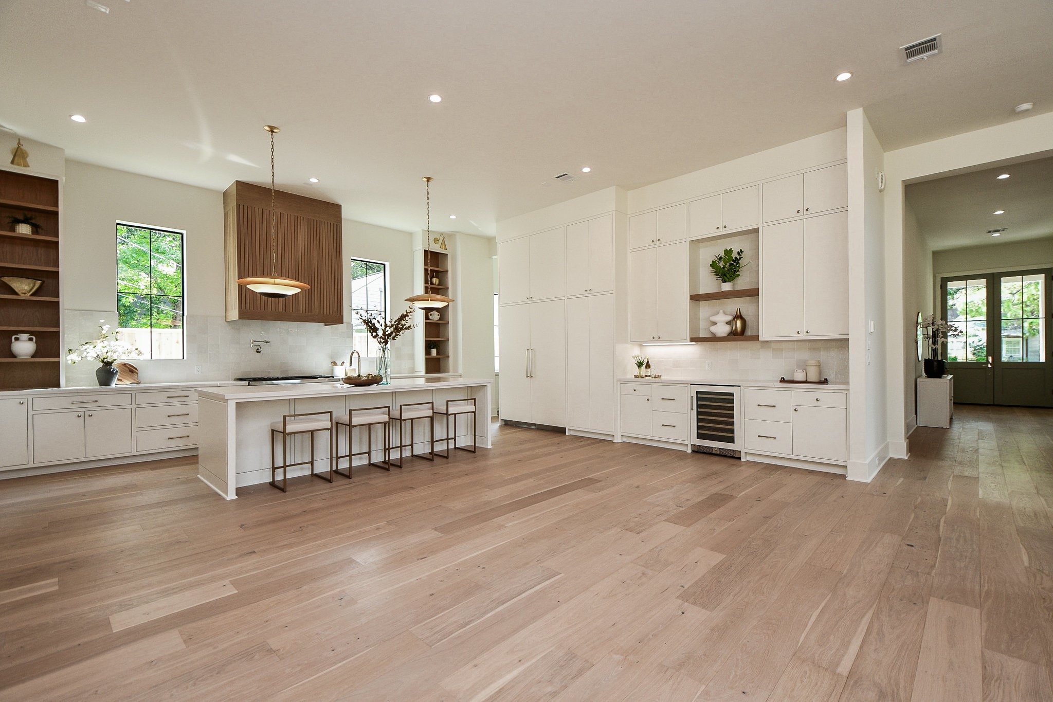 336 West 32nd Street Houston, TX 77018 - Photo 17 of 50 a kitchen with stainless steel appliances a stove top oven and a refrigerator