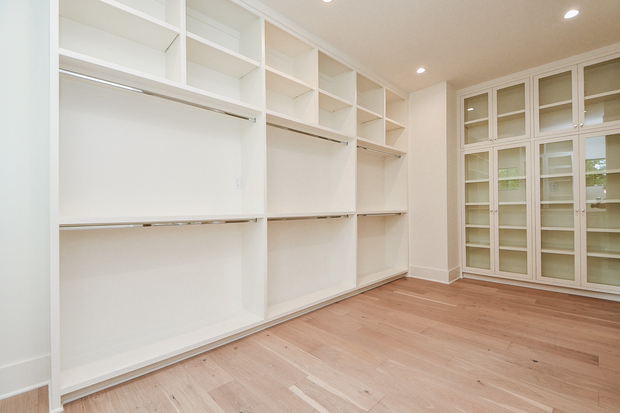 336 West 32nd Street Houston, TX 77018 - Photo 31 of 50 a view of an empty room with a window and wooden floor