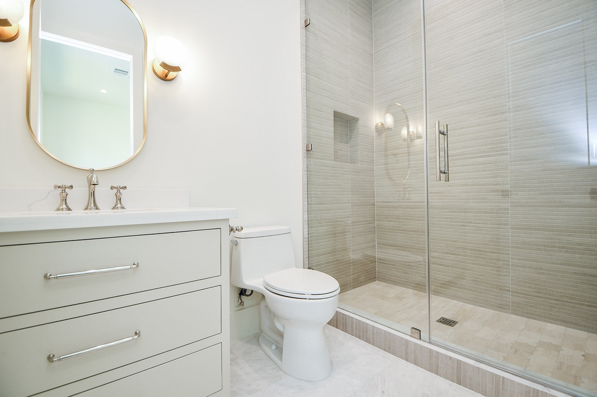 336 West 32nd Street Houston, TX 77018 - Photo 42 of 50 a bathroom with a sink a toilet and a mirror