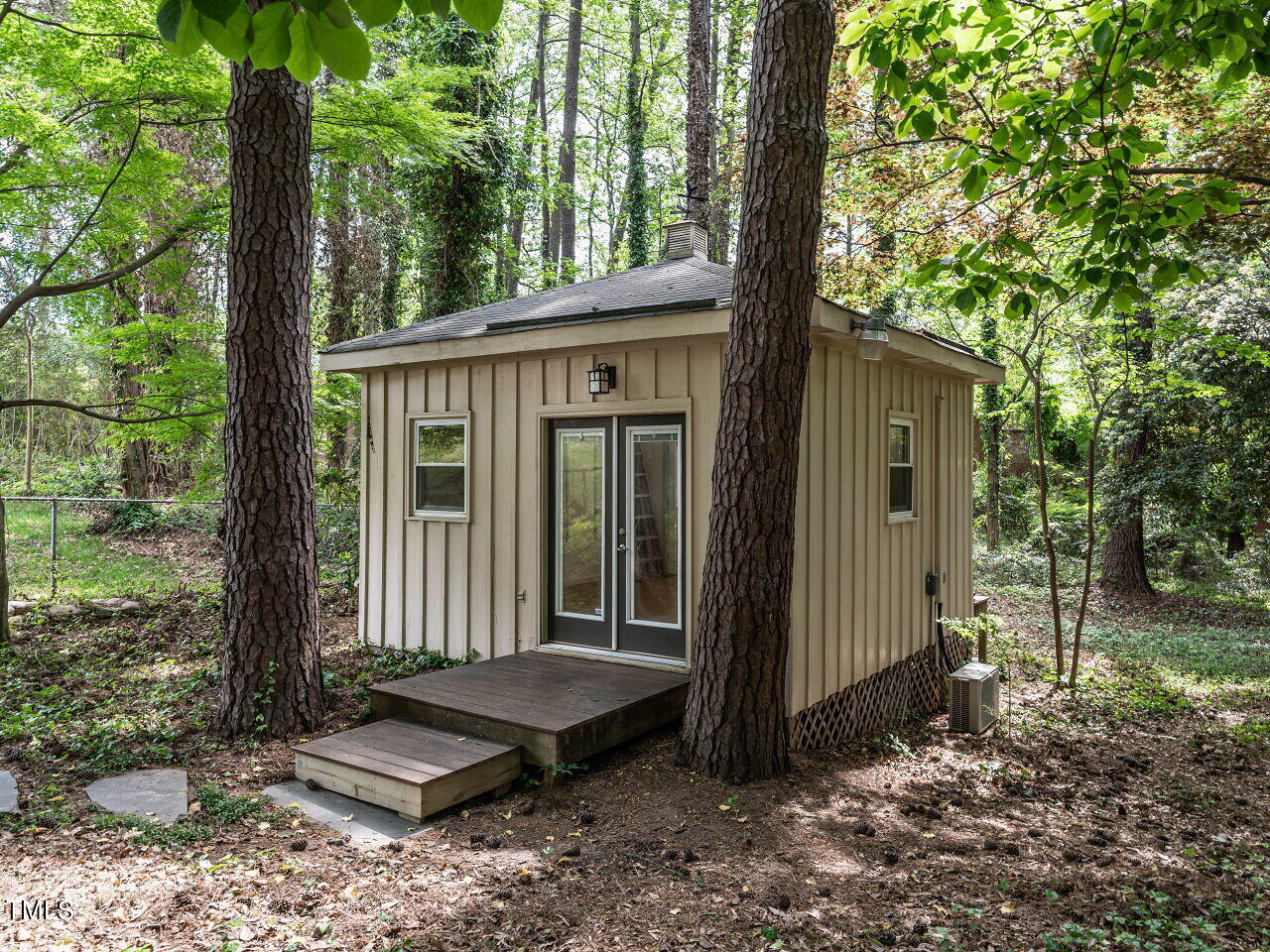 2204 Myron Drive Raleigh, NC 27607 - Photo 36 of 57 A shed, a studio, a hang out, a workshop, a hide-away...what ever you call you will love it. Power, heated and cooled, finished with LVP flooring and love.