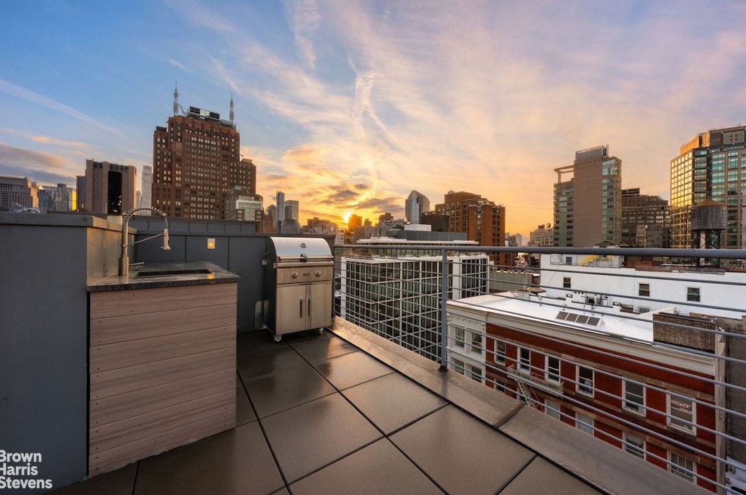 74 Grand Street, Unit PH Manhattan, NY 10013 - Photo 15 of 18 a balcony with a city view
