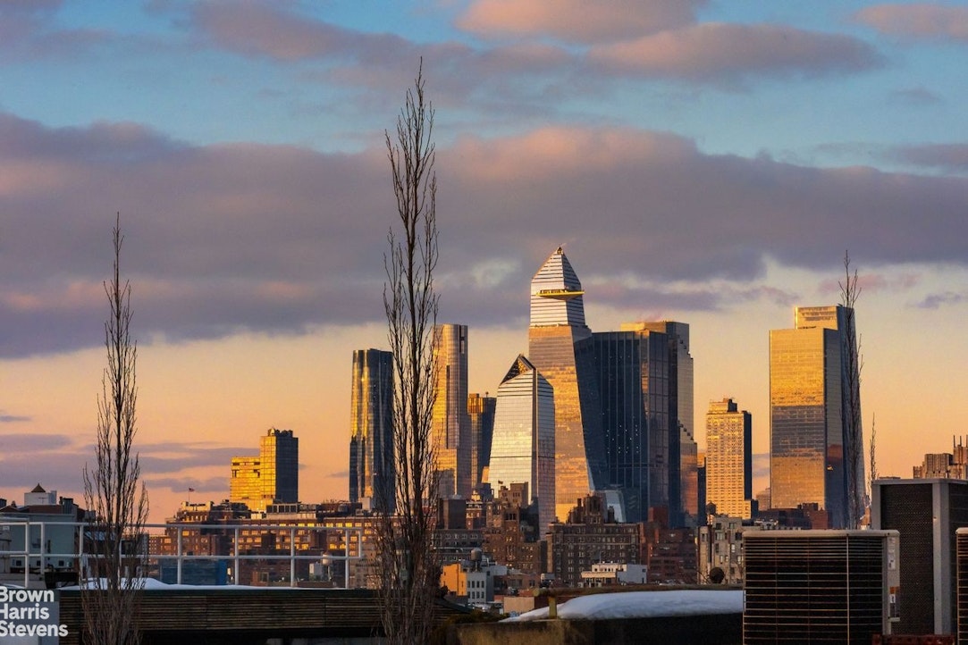 74 Grand Street, Unit PH Manhattan, NY 10013 - Photo 17 of 18 a view of a city with tall buildings