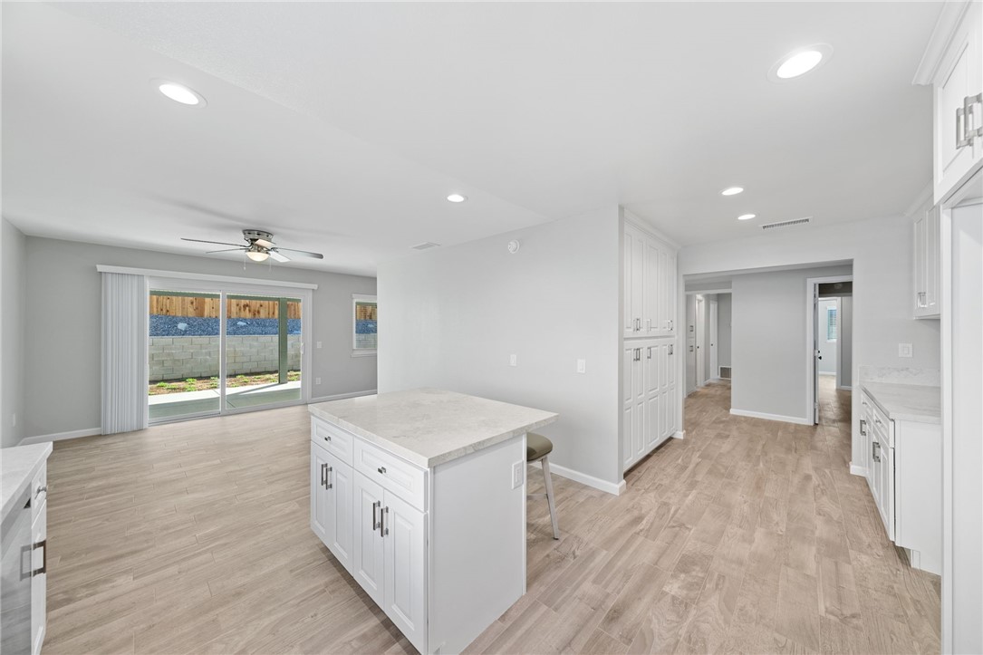 3386 Somis Drive Riverside, CA 92507 - Photo 11 of 31 a view of an empty room with wooden floor and a window