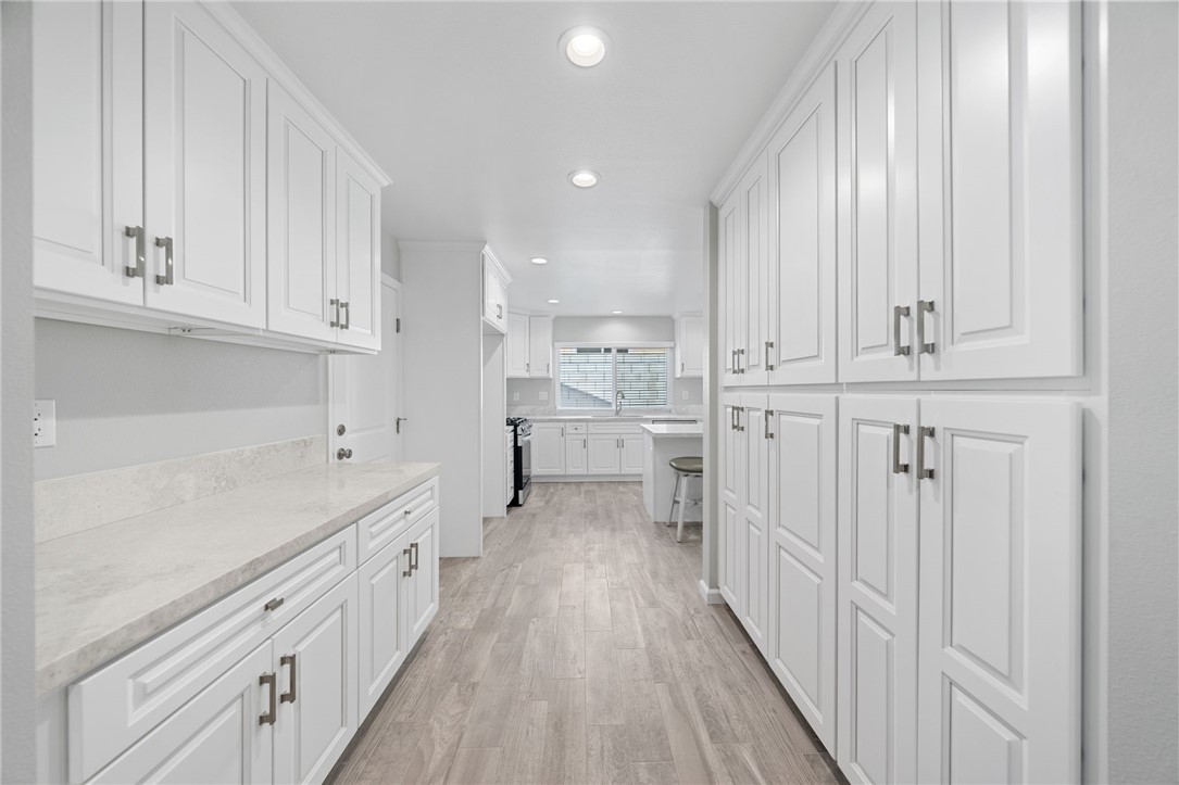 3386 Somis Drive Riverside, CA 92507 - Photo 12 of 31 a kitchen with white cabinets