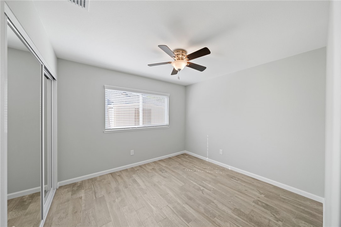 3386 Somis Drive Riverside, CA 92507 - Photo 20 of 31 an empty room with a window and a fan