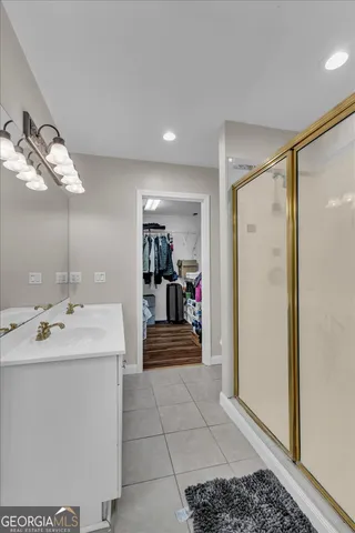 a kitchen with a stove and a refrigerator