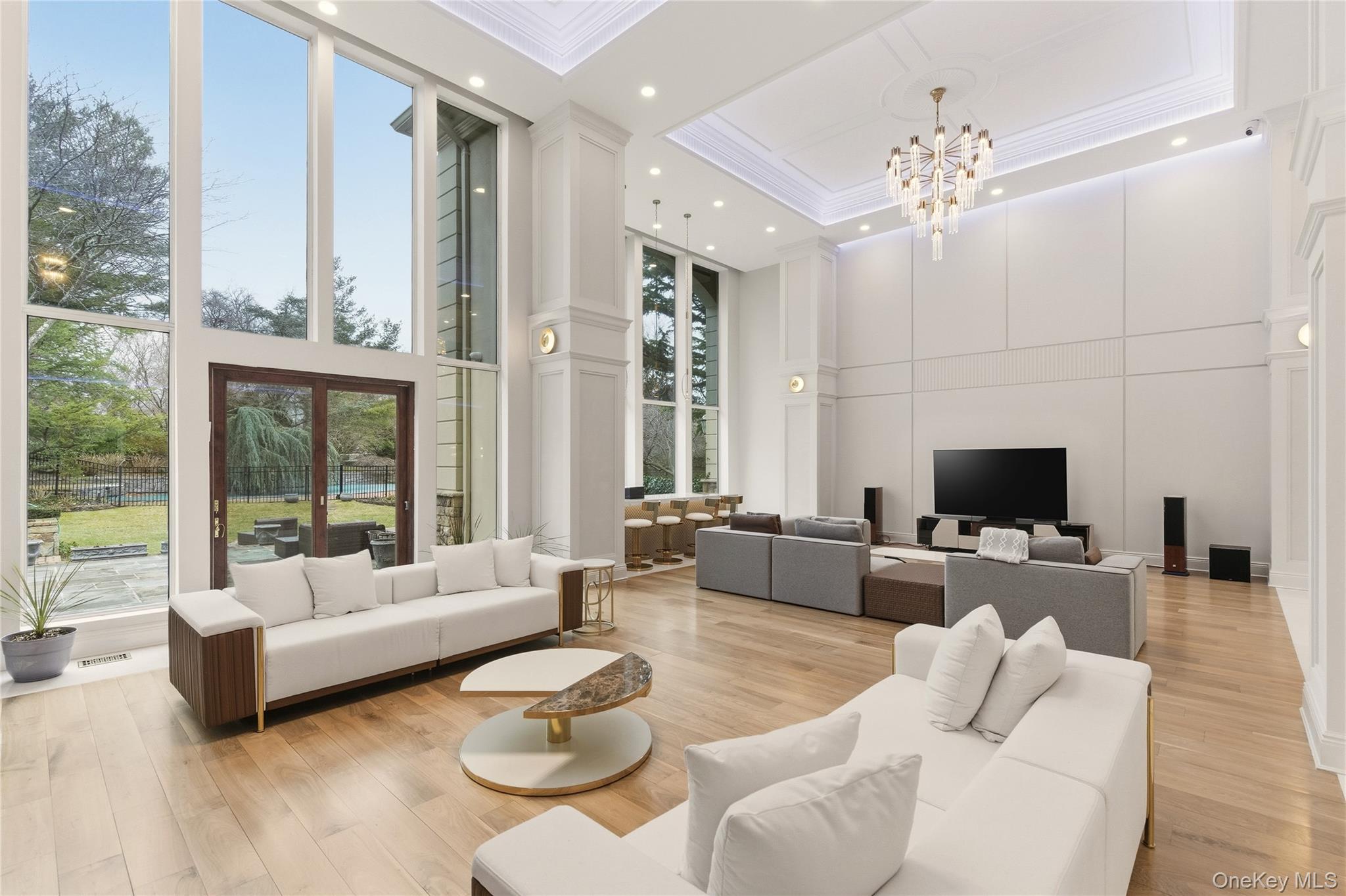 55 Coves Run Syosset, NY 11791 - Photo 7 of 50 a living room with furniture and a large window