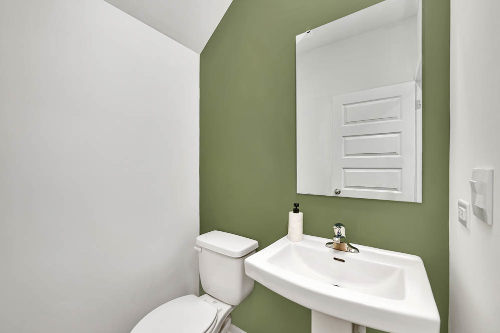 2261 Riesling Road Oswego, IL 60543 - Photo 12 of 23 a bathroom with a sink a toilet and mirror