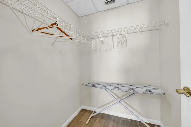 a view of a room with racks on the wall