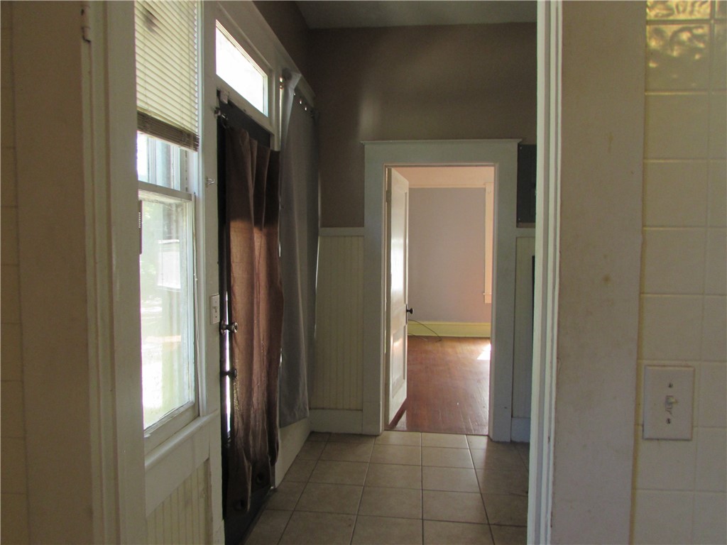 1003 Carswell Avenue Waycross, GA 31503 - Photo 11 of 25 Looking from the kitchen through the laundry room with the side entrance